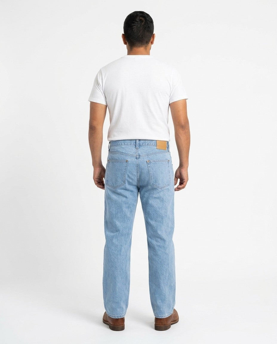 Back view of the iced indigo Relaxed Fit jeans showing rear pockets and seat.