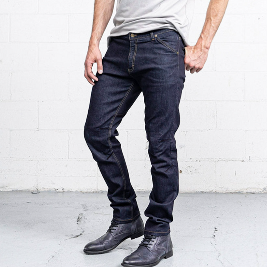 Commuter jeans in a dark indigo rinse wash, shown front on with slim legs below the knee.