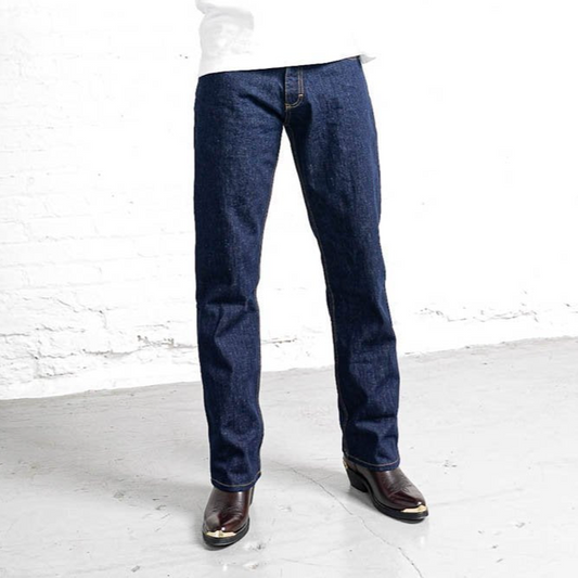 Dark wash boot cut jeans in 13oz 100% cotton denim, shown front view with five pockets and brass shank button.