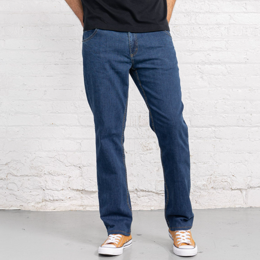 Dearborn Denim relaxed fit men's jeans in a medium wash, shown front view with five-pocket styling.