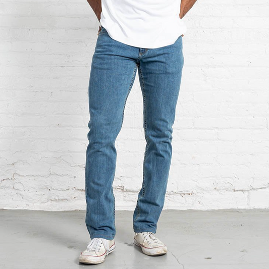 Tailored Fit light wash men's jeans shown front on, medium rise with a tapered leg below the knee.