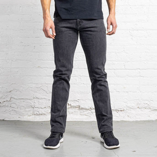 Dearborn Denim Tailored Fit jeans in a gray wash, shown front on with five-pocket stitching and belt loops.