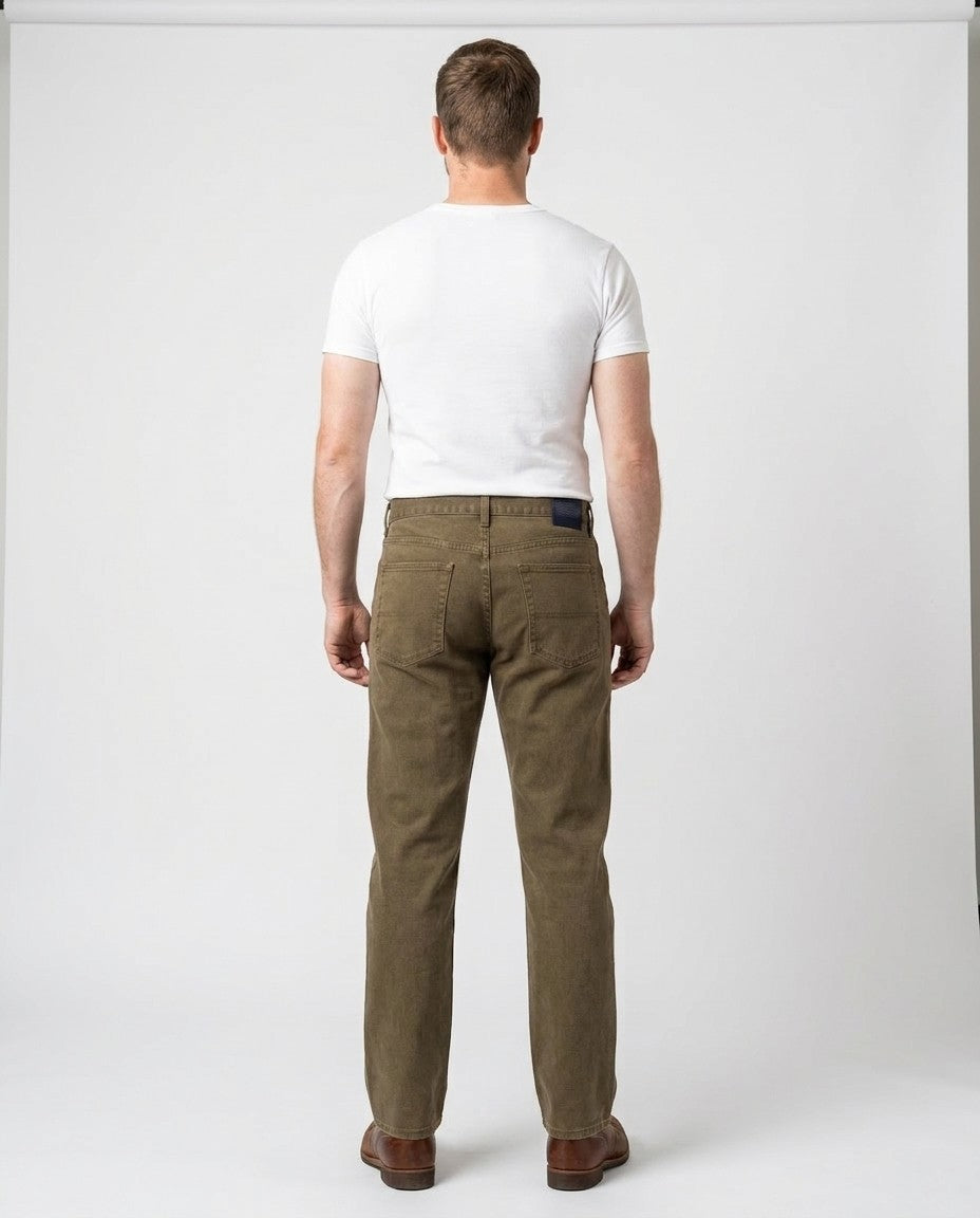 Back view of Mica wash Relaxed Fit jeans showing back pockets and Horween leather patch at the waistband.