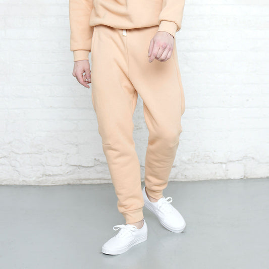 Dune colored sweatpants in athletic fit, shown front view