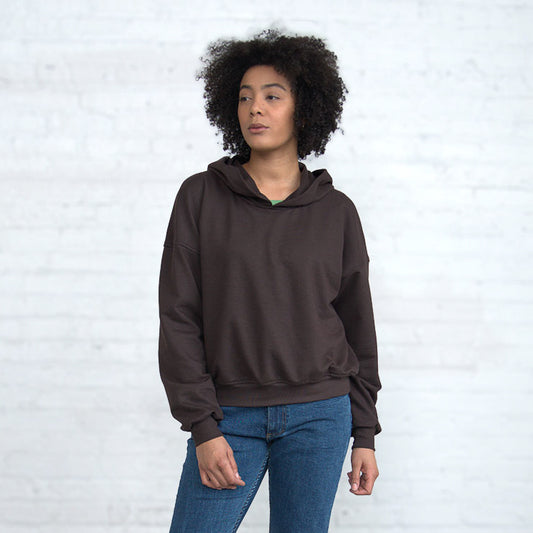 Front view of the Slouch Sweatshirt, a cropped hooded French terry sweatshirt with a drop shoulder.